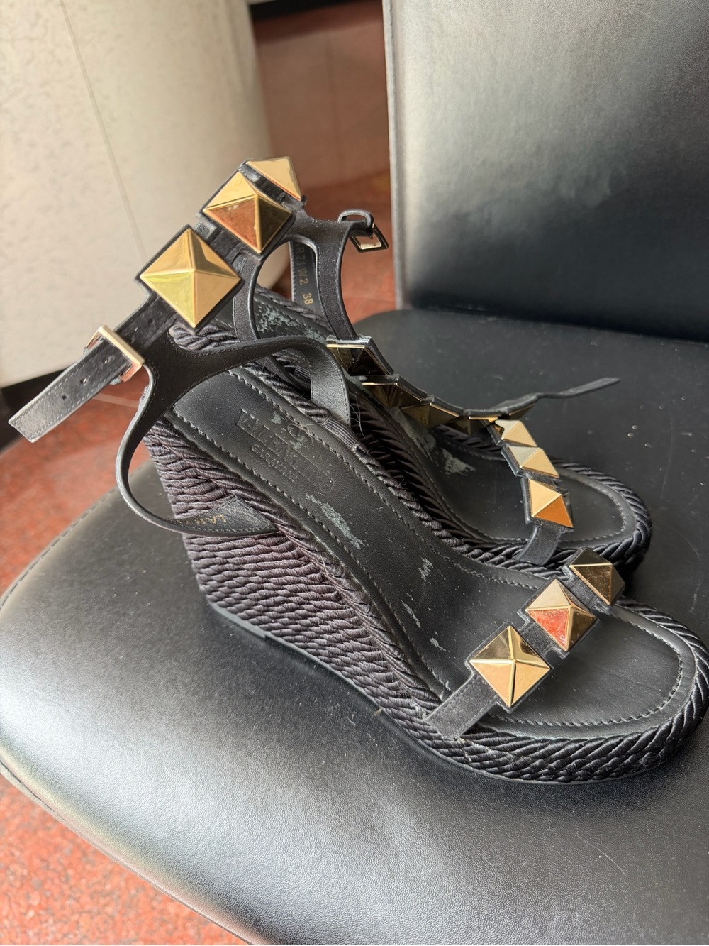 Valentino Garavani Black Wedge Sandals with Gold Pyramid Studs